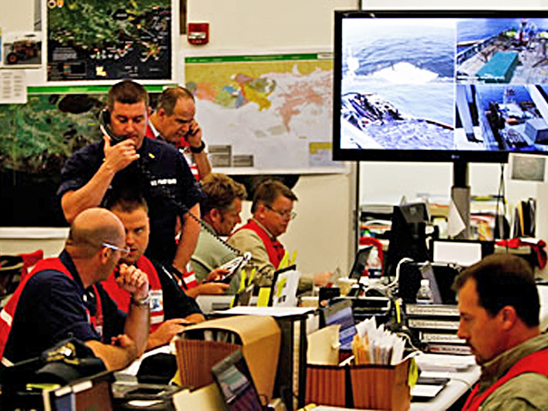 Oil Spill Response Office Staff on Phones and at Computers